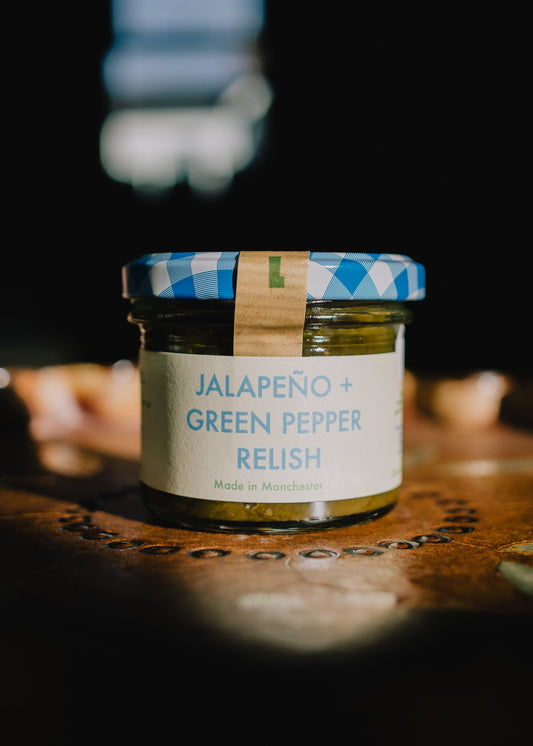 Jar of jalapeño and green pepper relish. Cheeseboard accompanyment. Gift idea for foodie.