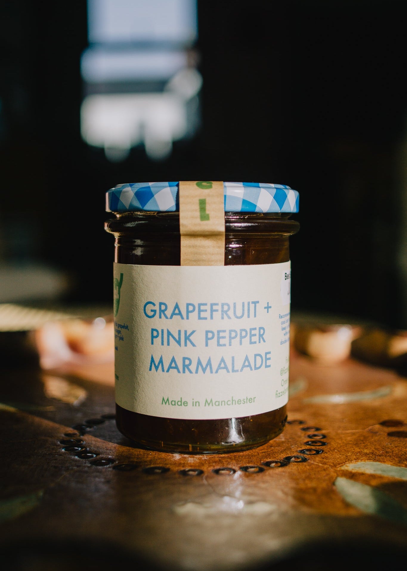 Jar of grapefruit and pink pepper marmalade, perfct Christmas festive gift for foodie and food loving friends. 