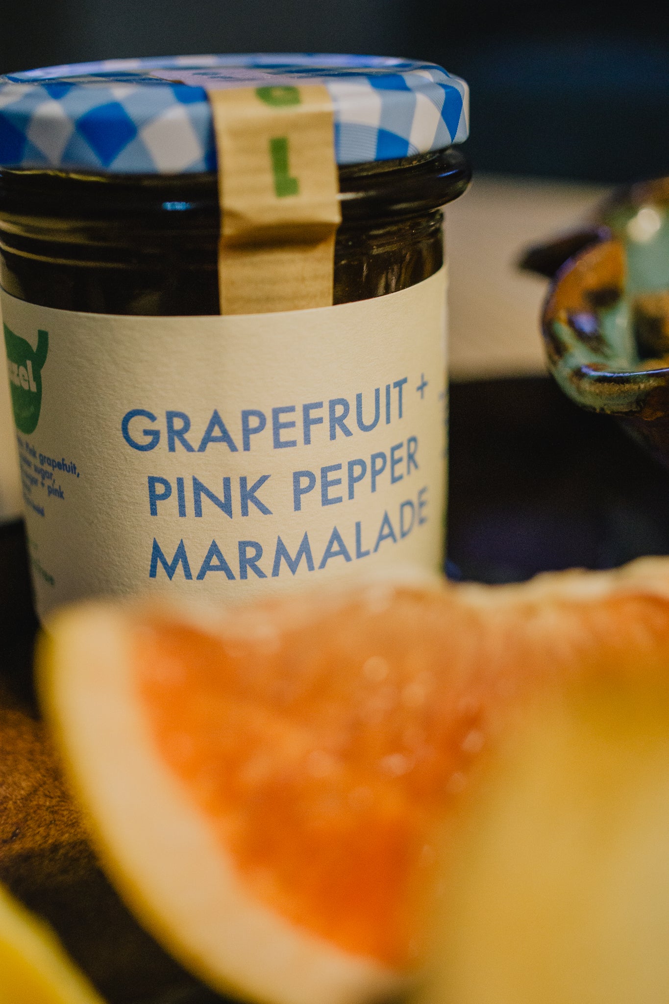 Jar of grapefruit and pink pepper marmalade, perfct Christmas festive gift for foodie and food loving friends. 
